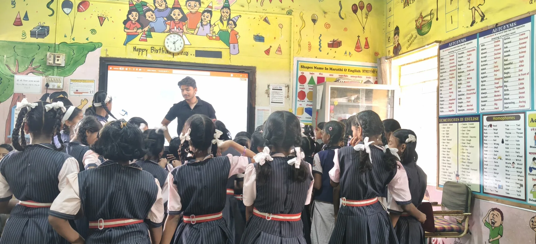 Children taking part in a group learning activity in India
